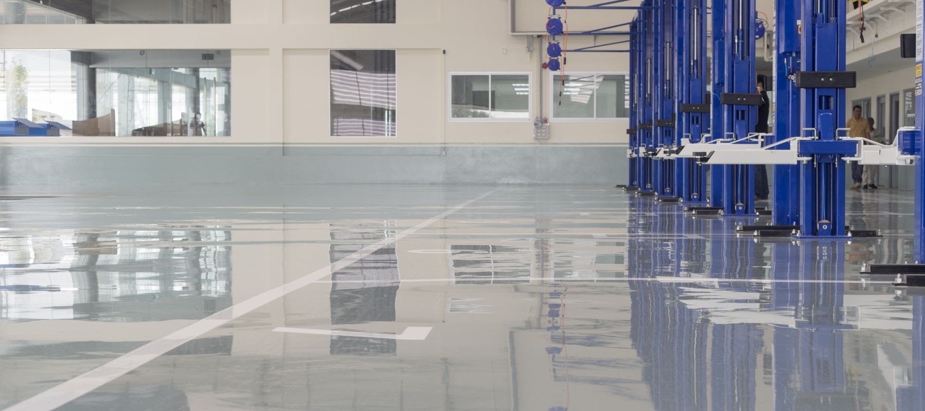 image of gray commercial flooring in an industrial warehouse