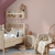 Harris Paints Colour of the Year 2023: Prosperity 0107 paint colour in a nursery with a calming lighter pink